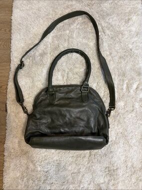 Wanderers Travel Co olive green bag.